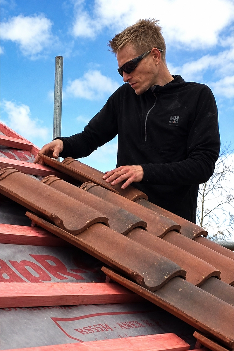 Experienced roofer Joe Horton working on a Grimsby roof