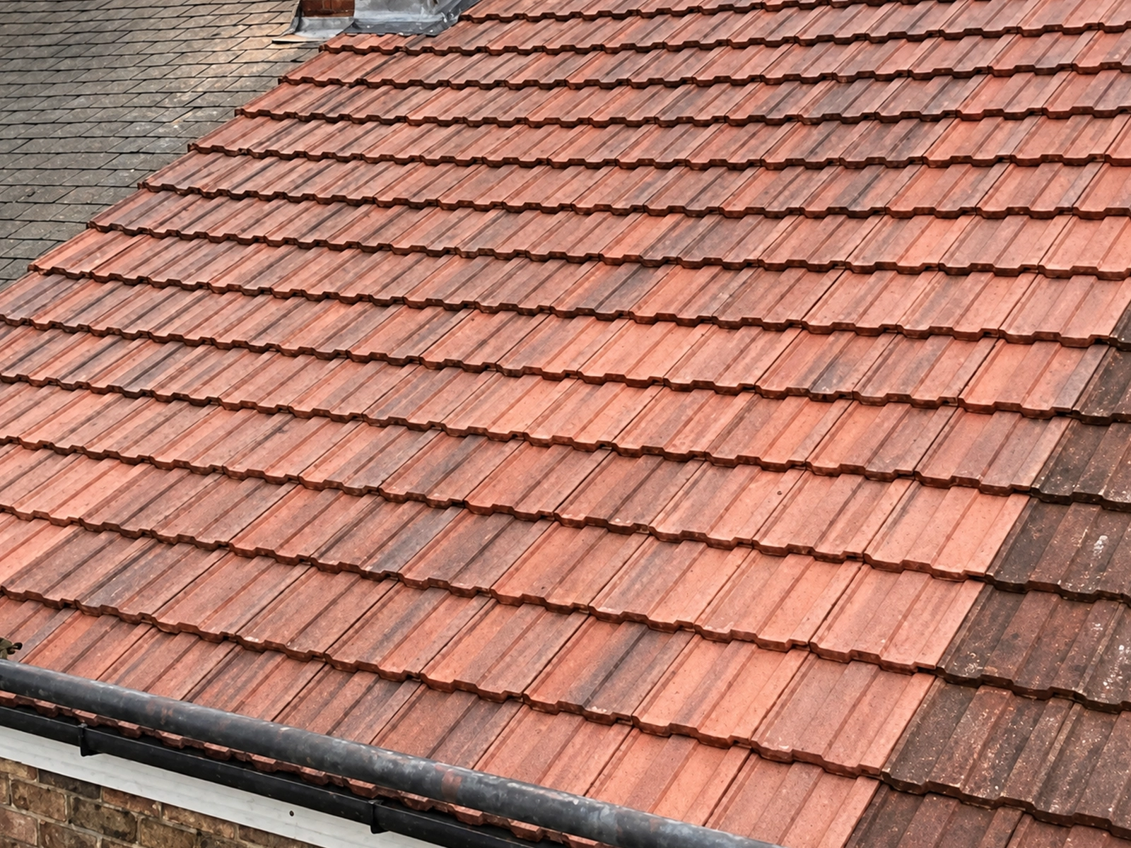 New tiled roof installation with chimney and lead flashing, Grimsby