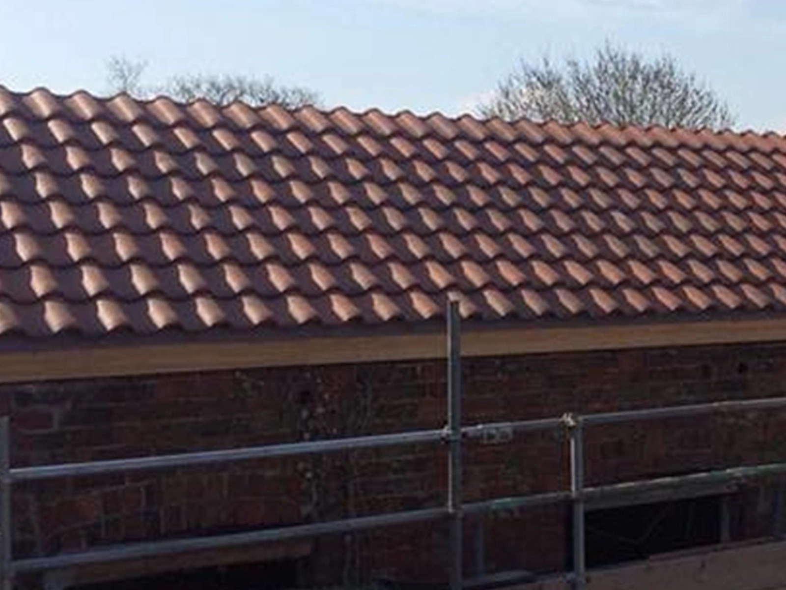 Roof tile installation in progress, North East Lincolnshire